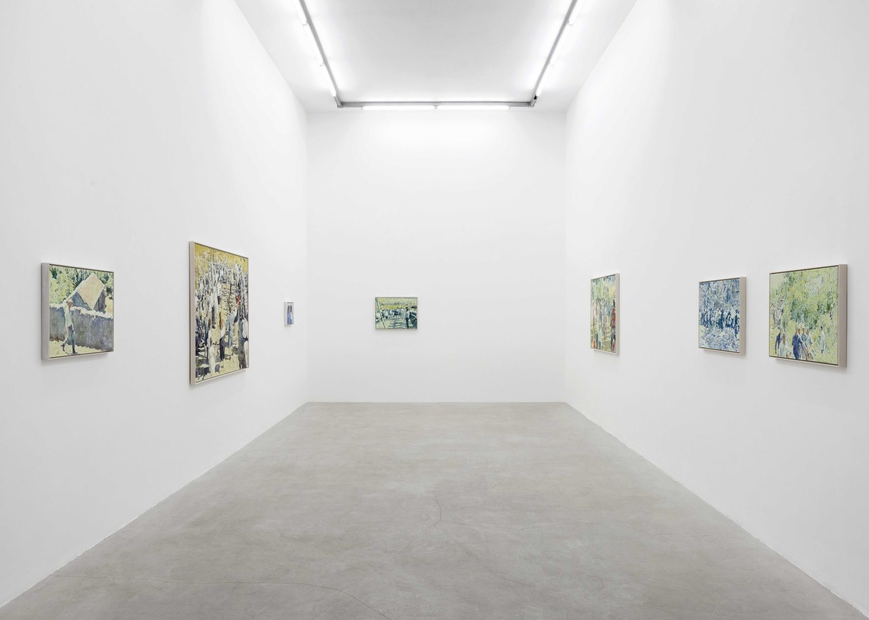 Art gallery with white walls, paintings on display. Bright space offers art advisory and art-cultural investment solutions.